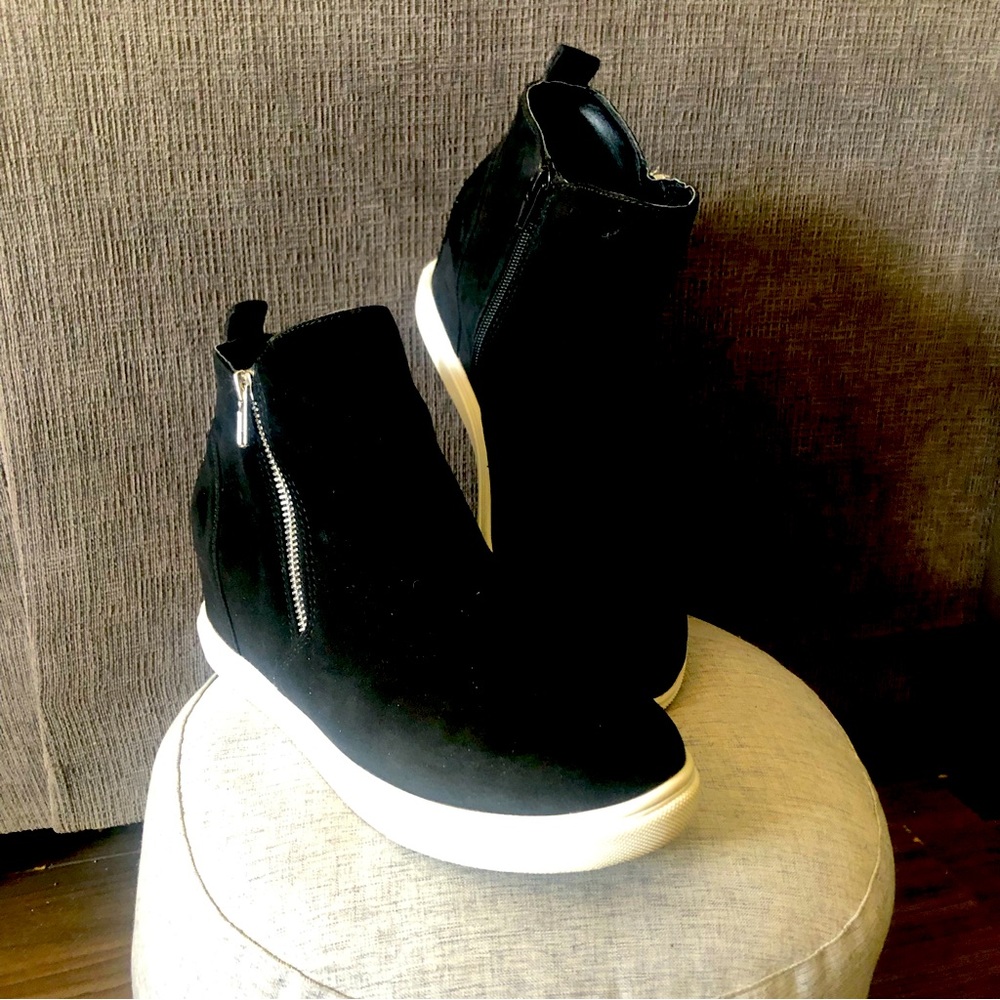 Trendy black suede martial high top flats.